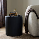 Four Hands Layo End Table in Black Resinon in a neutral living room at Addison West