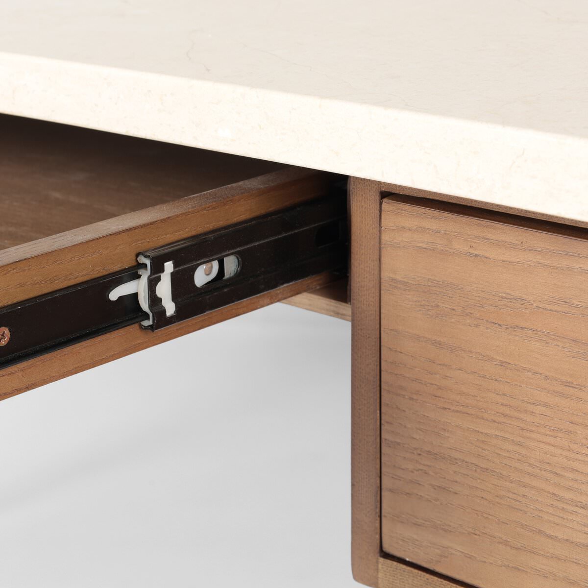 Close up of Four Hands Lorna Desk in Amber Ash Veneer on a white background at Addison West