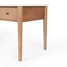 Close up of Four Hands Lorna Desk in Amber Ash Veneer on a white background at Addison West