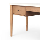 Close up of Four Hands Lorna Desk in Amber Ash Veneer on a white background at Addison West