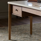 Close up of Four Hands Lorna Desk in Amber Ash Veneer in an office at Addison West