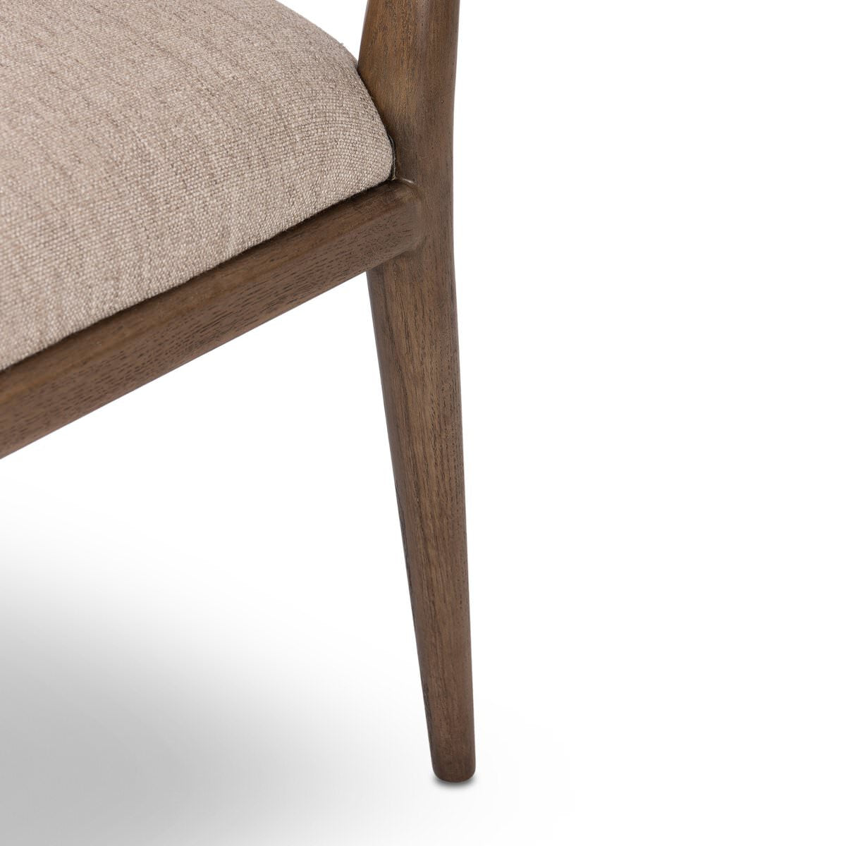 Close up of Four Hands Marley Dining Chair in Alcala Wheat on a white background at Addison West