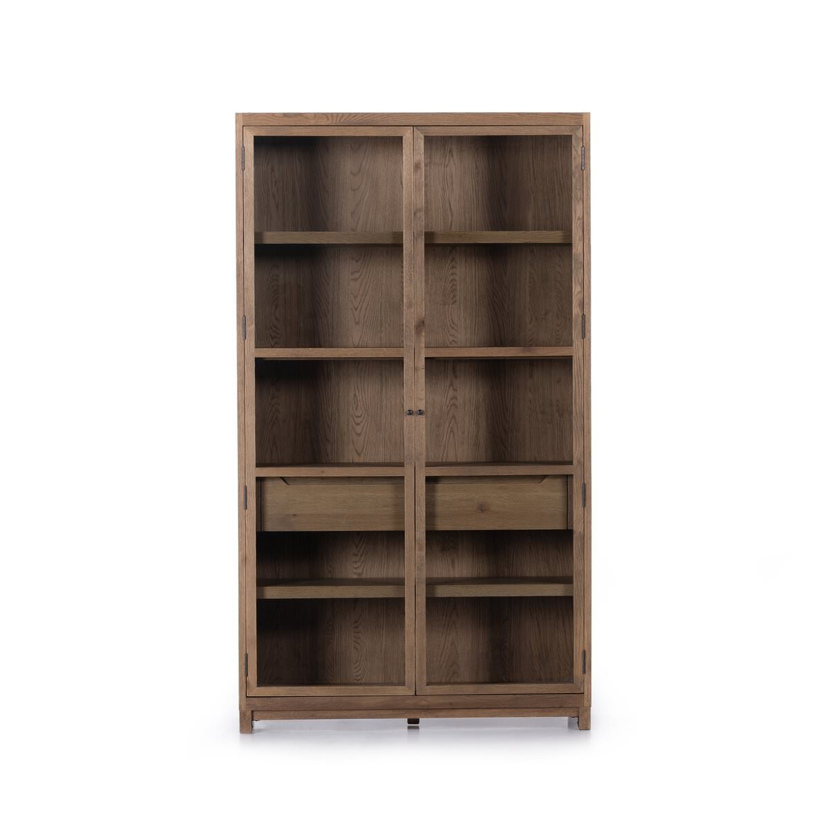 Four hands furniture brand Millie oak cabinet with glass doors and four shelves and interior drawer on a white background