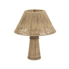 Four Hands Nessa Table Lamp in Antique Brass Iron on a white background at Addison West