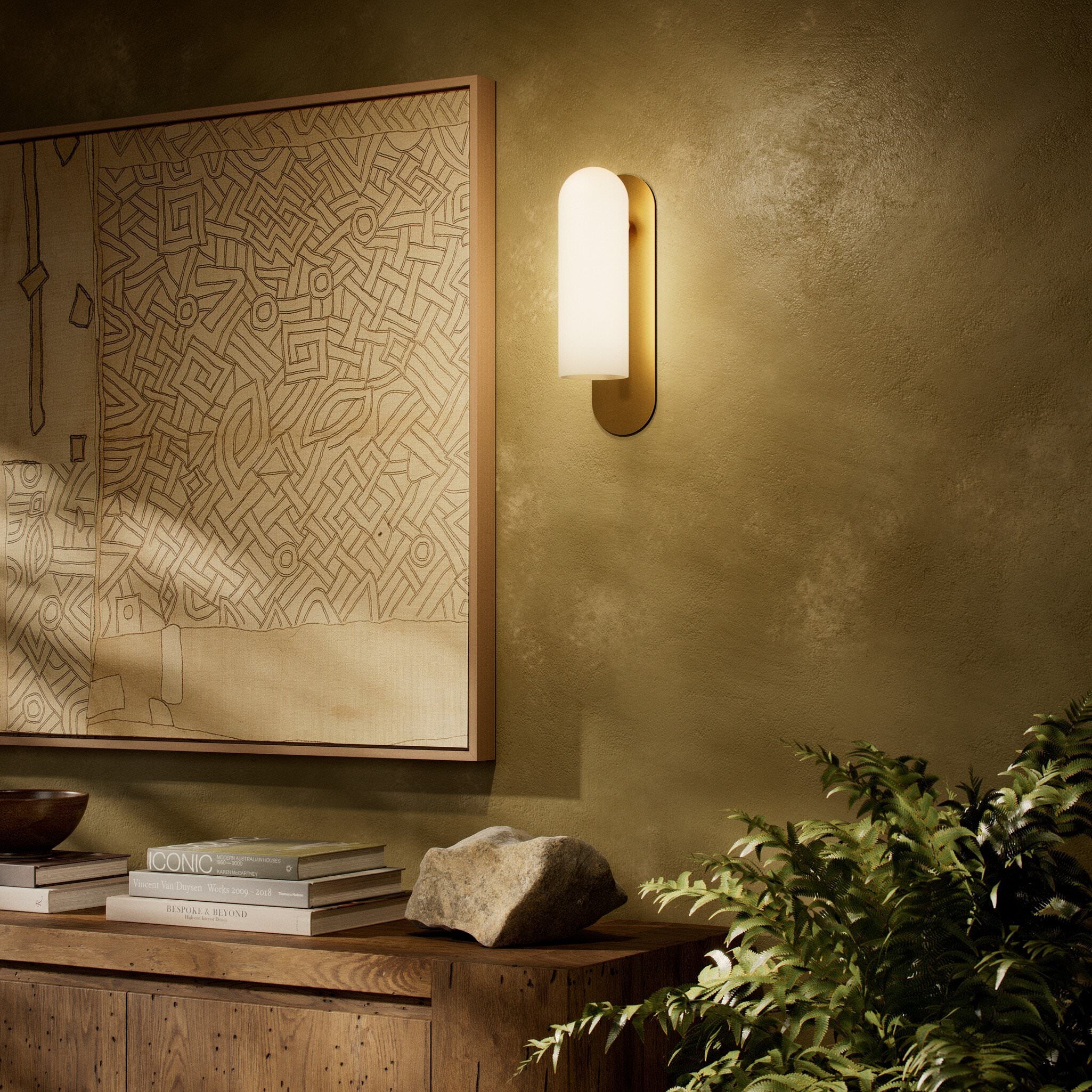 Four Hands Odyssey Sconce in Burnished Brass with Opal Matte Glass, 15" in living room at Addison West.