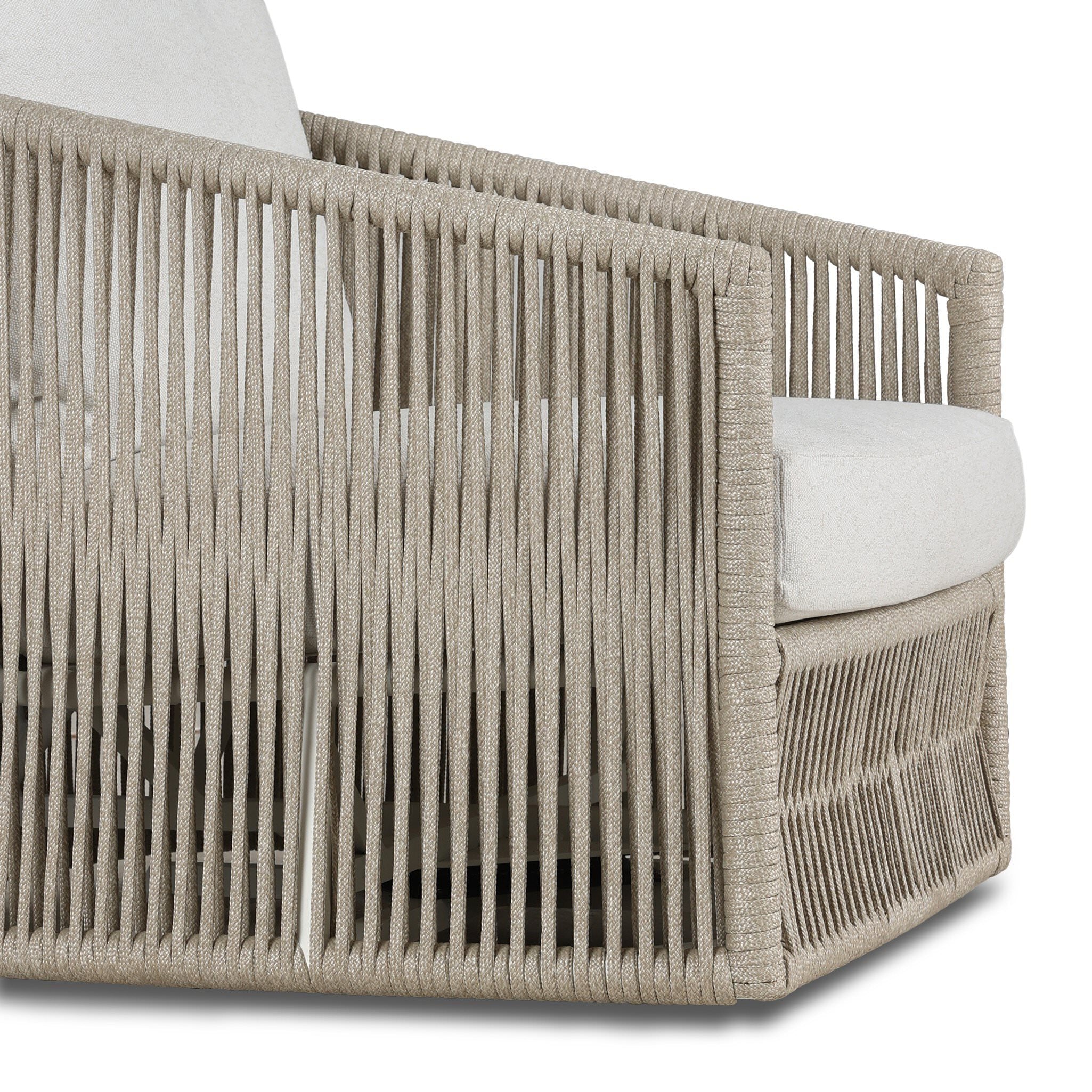 Close up of Four Hands Porto Outdoor Swivel Chair in Alessi Linen on a white background at Addison West