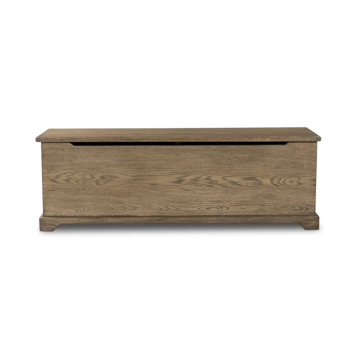 Four Hands Quintin Trunk in Worn Oak on a white background at Addison West