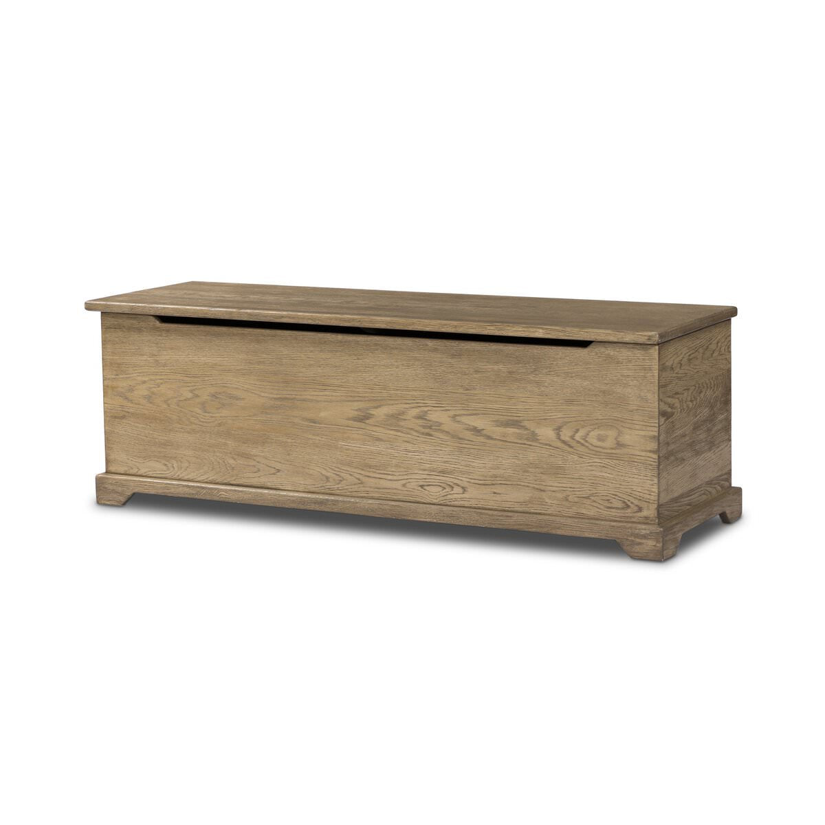 Four Hands Quintin Trunk in Worn Oak on a white background at Addison West