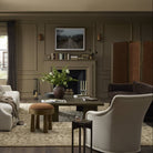 Four Hands Relo End Table in Olive Cast Glass in a living room at Addison West