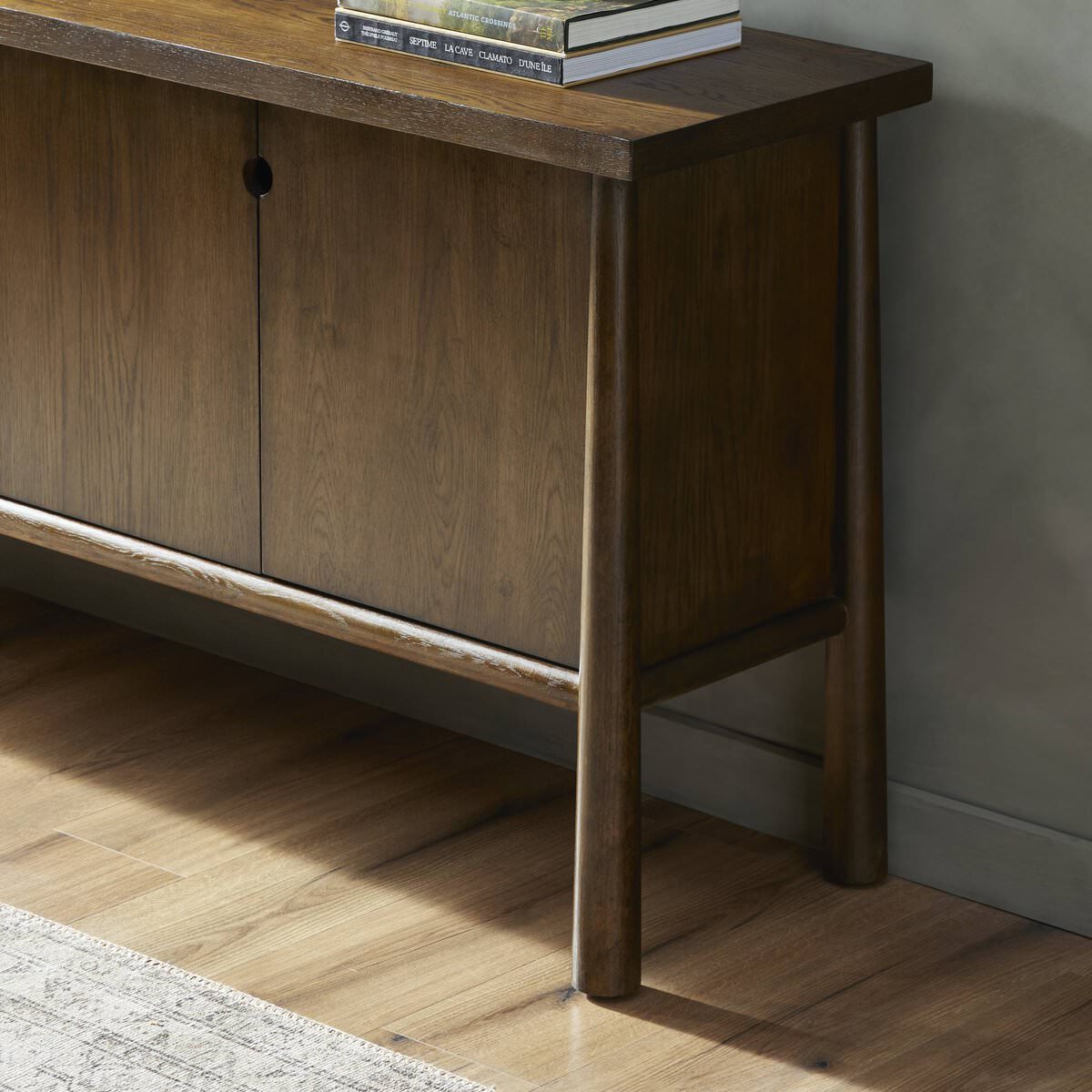 Close up of Four Hands Renaud Sideboard in Dark Toasted Oak in an entryway at Addison West
