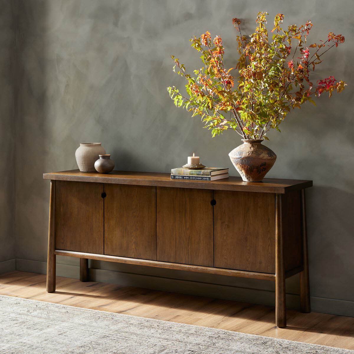Four Hands Renaud Sideboard in Dark Toasted Oak in an entryway at Addison West
