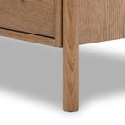 Close up of leg of Four Hands Roark Nightstand on a white background