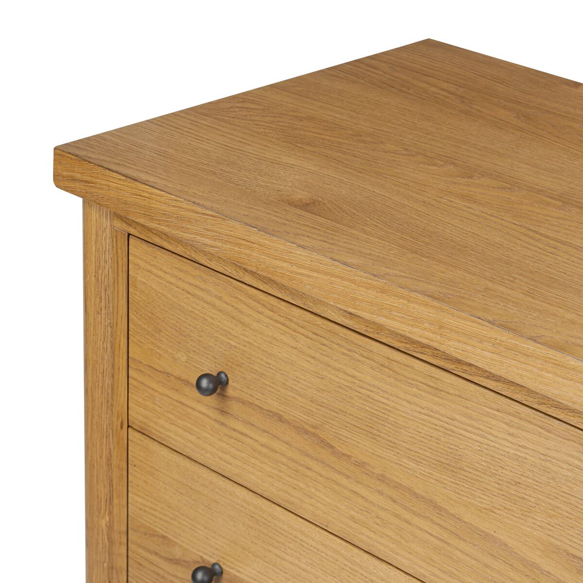 Close up of Four Hands Roark Tall Dresser in Amber Oak on a white background at Addison West