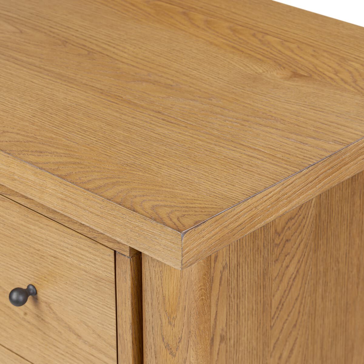 Close up of Four Hands Roark Tall Dresser in Amber Oak on a white background at Addison West