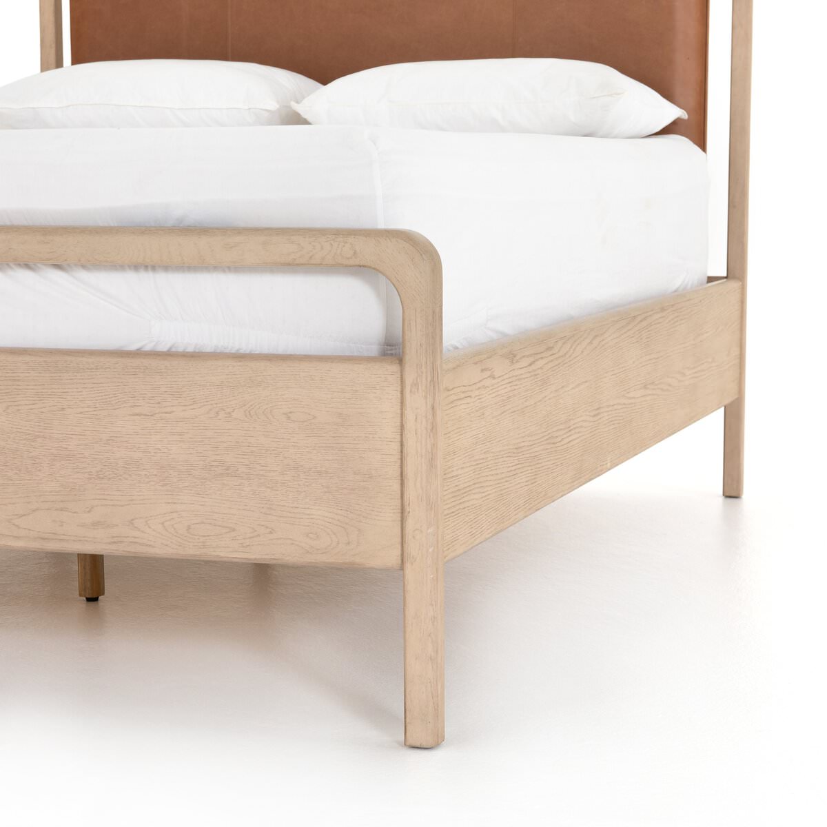 Close up of Four Hands Rosedale Bed Bed in Chaps Sand on a white background