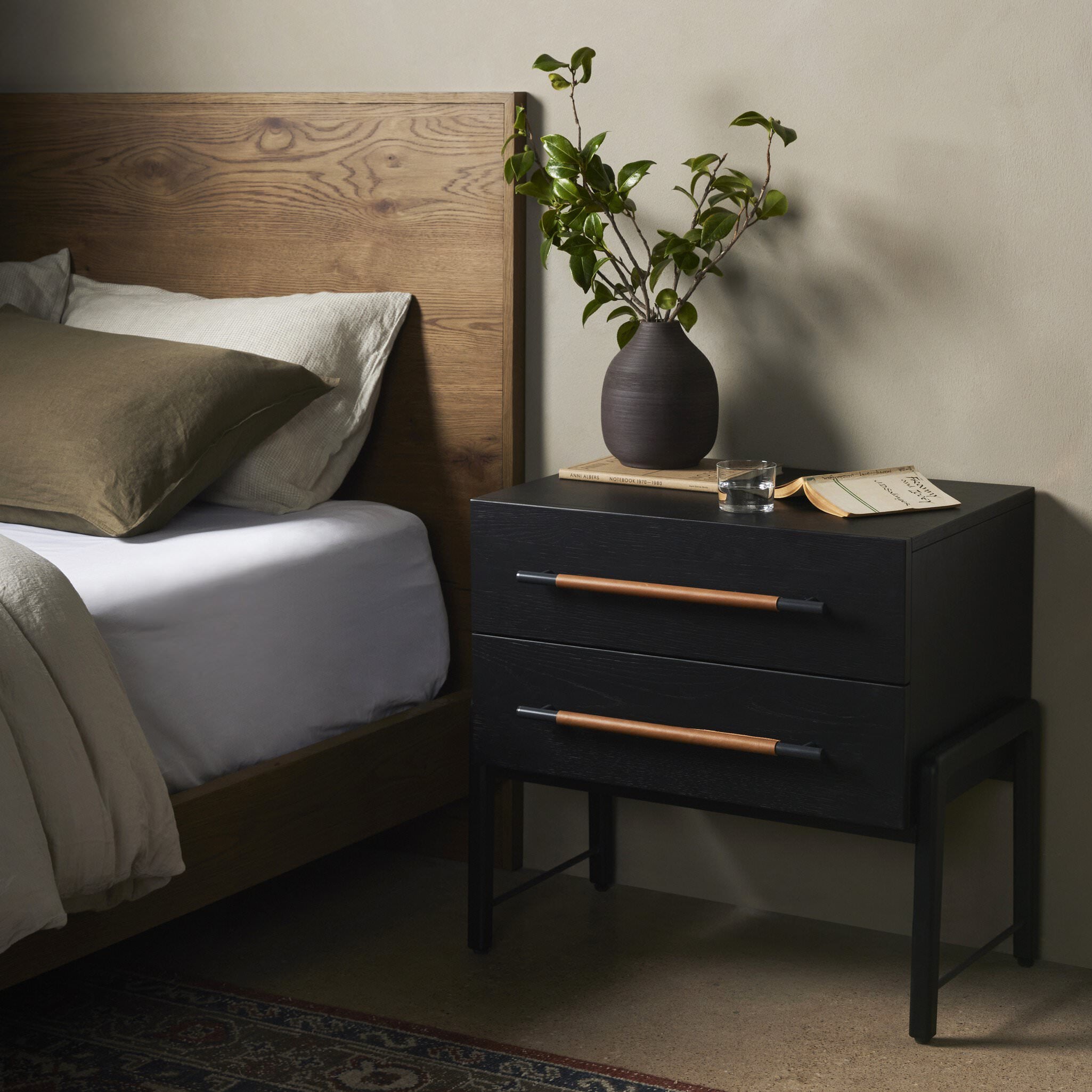 Four Hands Rosedale Nightstand in Ebony Oak Veneer in bedroom at Addison West.