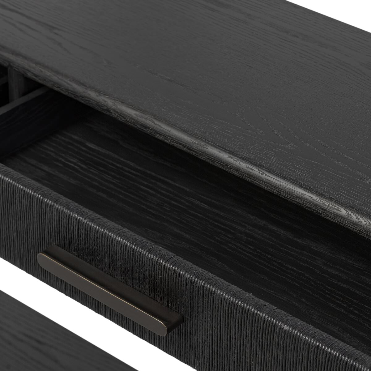 Close up of Four Hands Rosenell Console Table - 78" in Black Oak Solid on a white background at Addison West