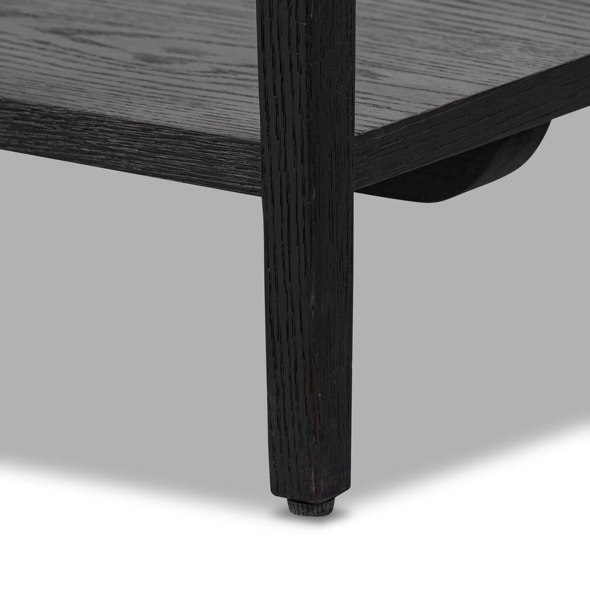 Close up of Four Hands Rosenell Console Table - 78" in Black Oak Solid on a white background at Addison West