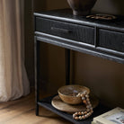 Close up of Four Hands Rosenell Console Table - 78" in Black Oak Solid in a living room at Addison West