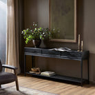 Four Hands Rosenell Console Table - 78" in Black Oak Solid in a living room at Addison West