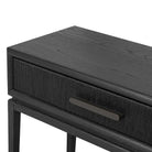 Close up of Four Hands Rosenell Console Table 60" in Black Oak Solid on a white background at Addison West