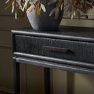 Close up of Four Hands Rosenell Console Table 60" in Black Oak Solid in a living room at Addison West