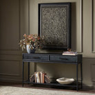 Four Hands Rosenell Console Table 60" in Black Oak Solid in a living room at Addison West