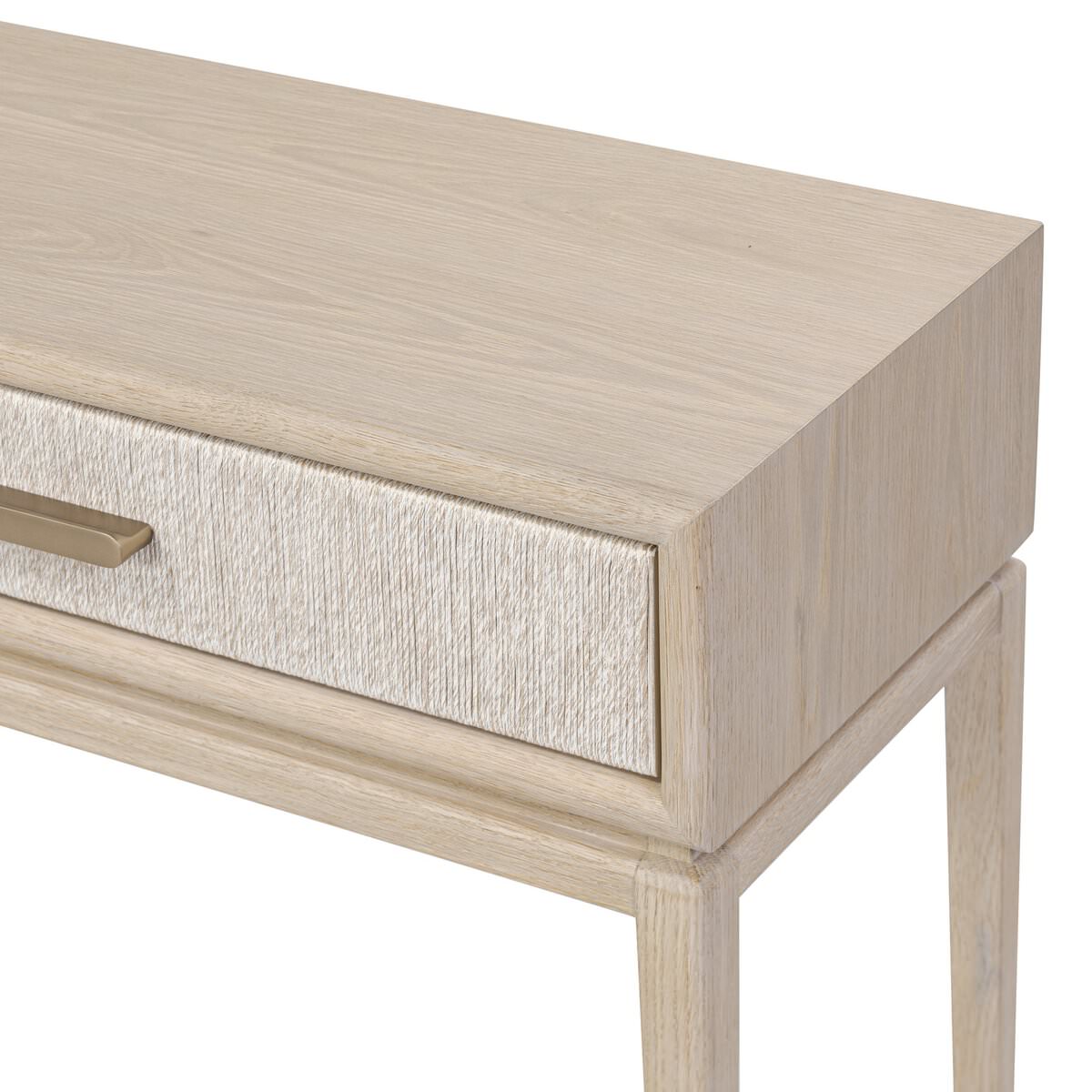 Close up of Four Hands Rosenell Console Table 60" in Natural Oak Solid on a white background at Addison West