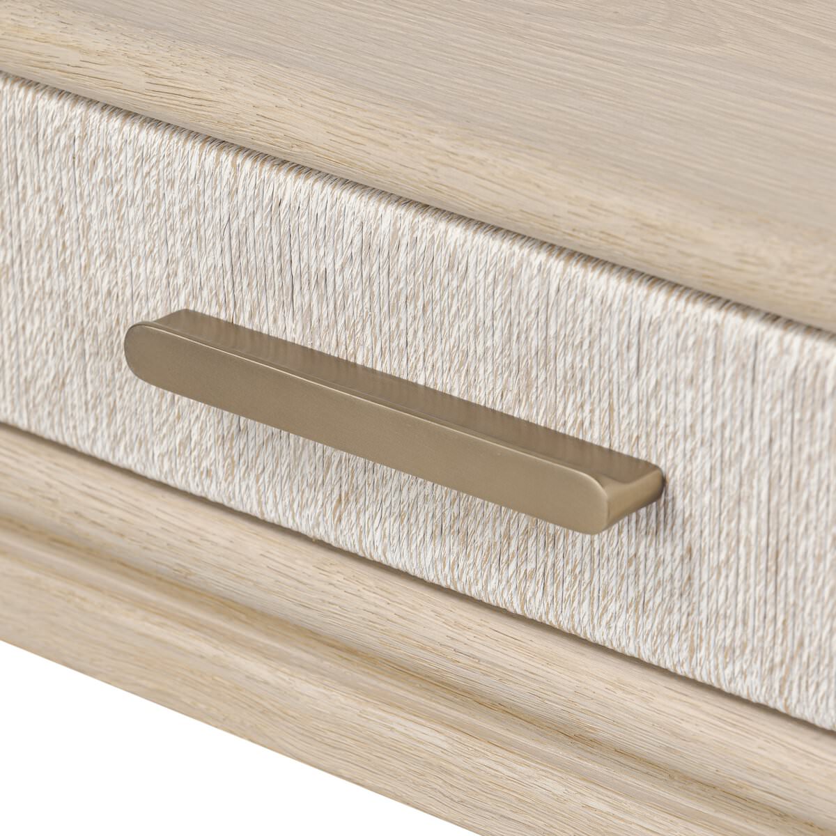 Close up of Four Hands Rosenell Console Table 60" in Natural Oak Solid on a white background at Addison West