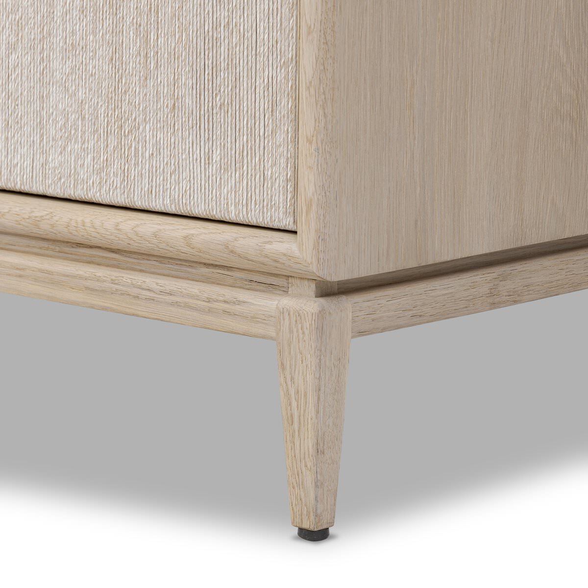 Close up of Four Hands Rosenell Sideboard in Natural Paper Cord on a white background at Addison West