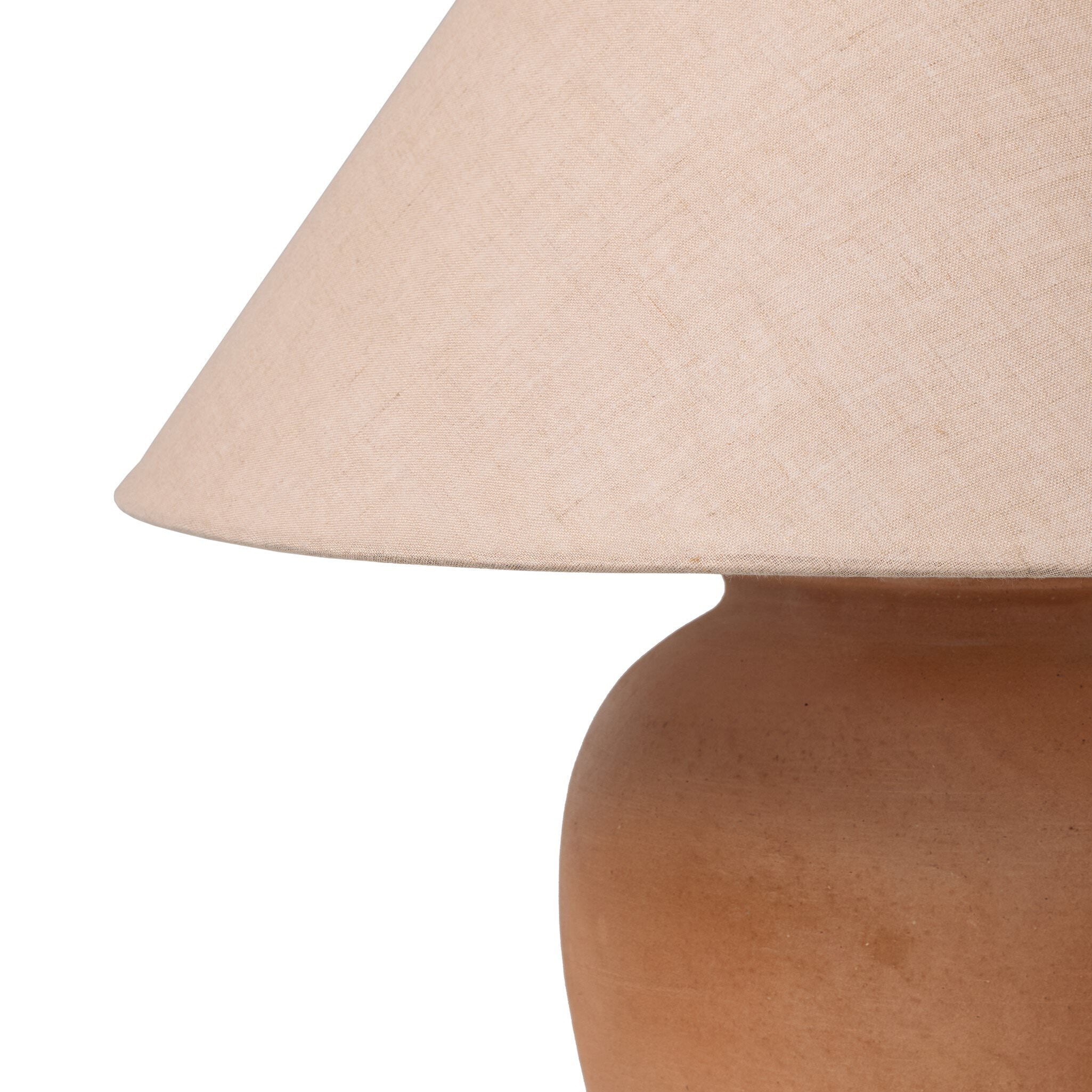 Close up of Four Hands Russo Table Lamp in Aged Natural Terracotta on a white background at Addison West