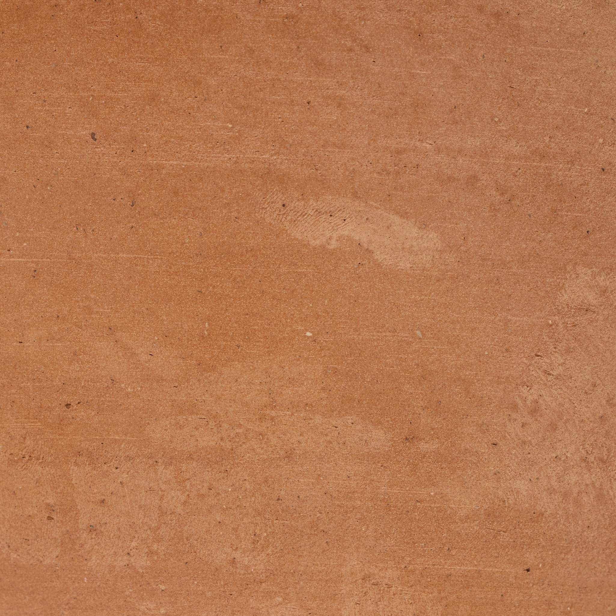 Close up of Four Hands Russo Table Lamp in Aged Natural Terracotta on a white background at Addison West