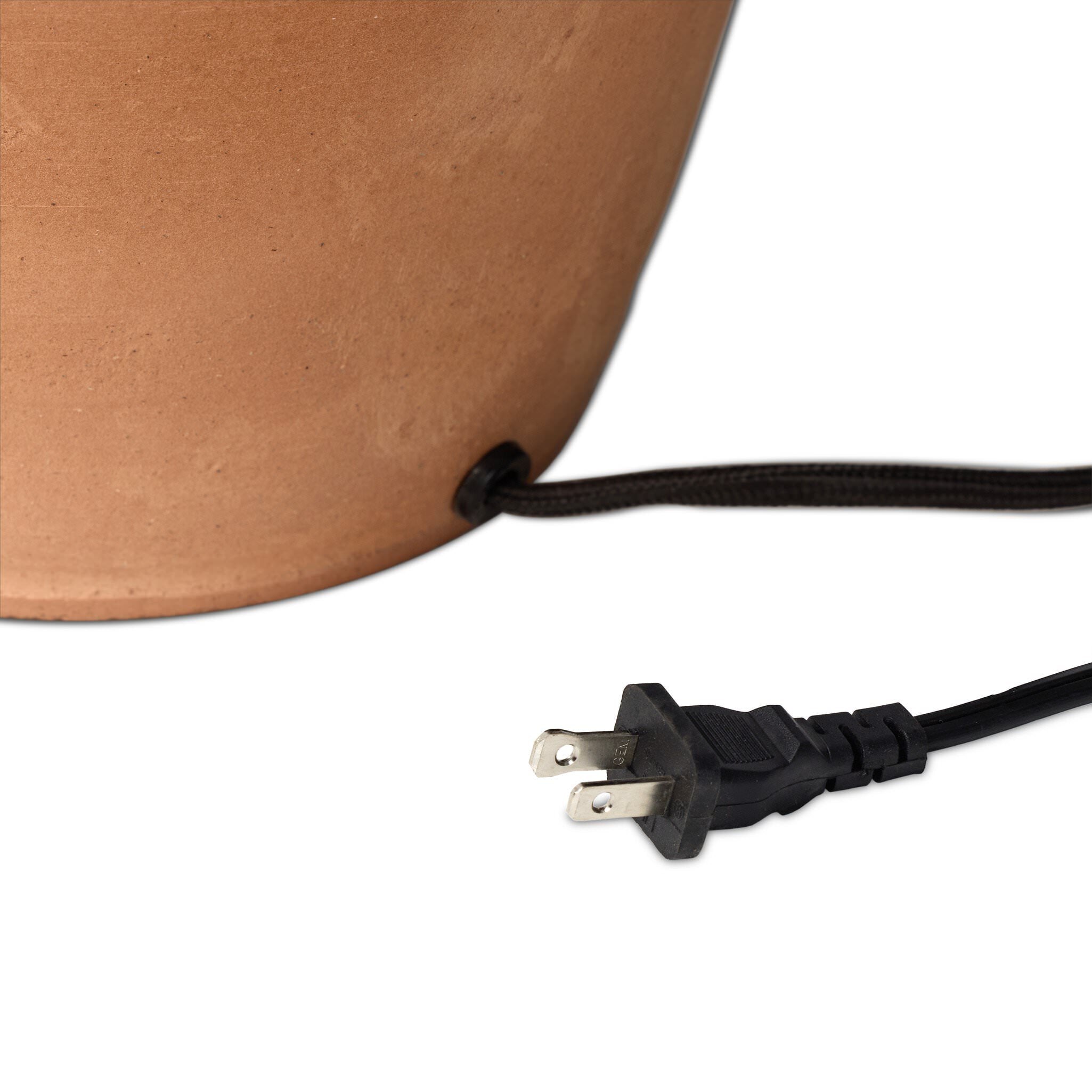 Close up of Four Hands Russo Table Lamp in Aged Natural Terracotta on a white background at Addison West