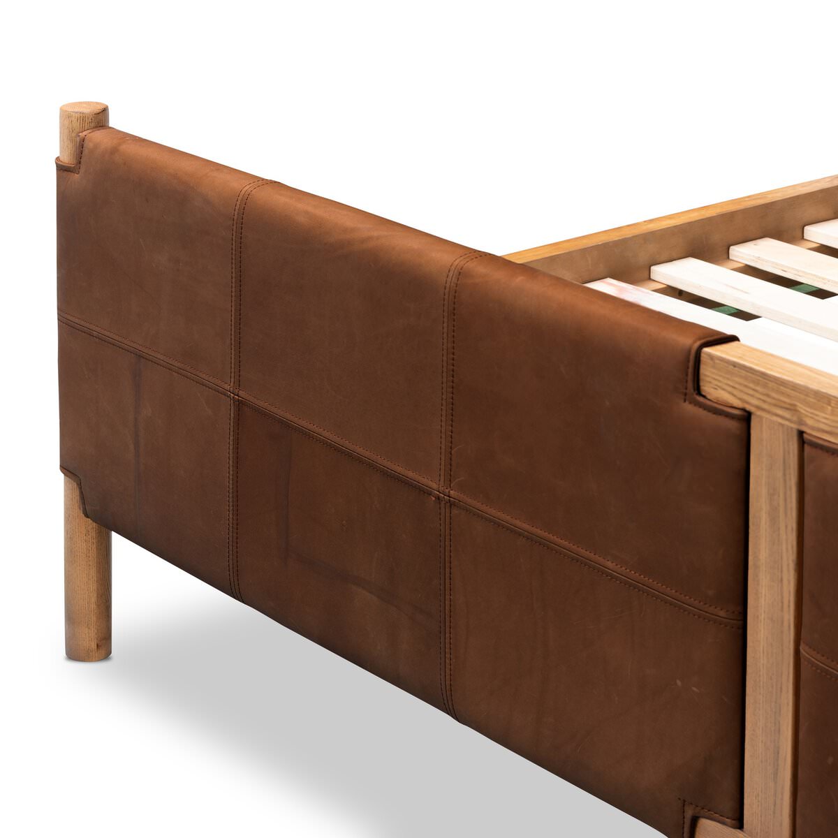 Close up of Four Hands Salado Bed in Heirloom Sienna on a white background at Addison West