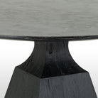 Close up of Four Hands Sargon Dining Table in Bluestone on a white background at Addison West