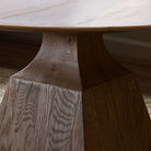 Close up of Four Hands Sargon Dining Table in Honed White Marble in a dining room at Addison West