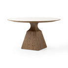 Four Hands Sargon Dining Table in Honed White Marble on a white background at Addison West