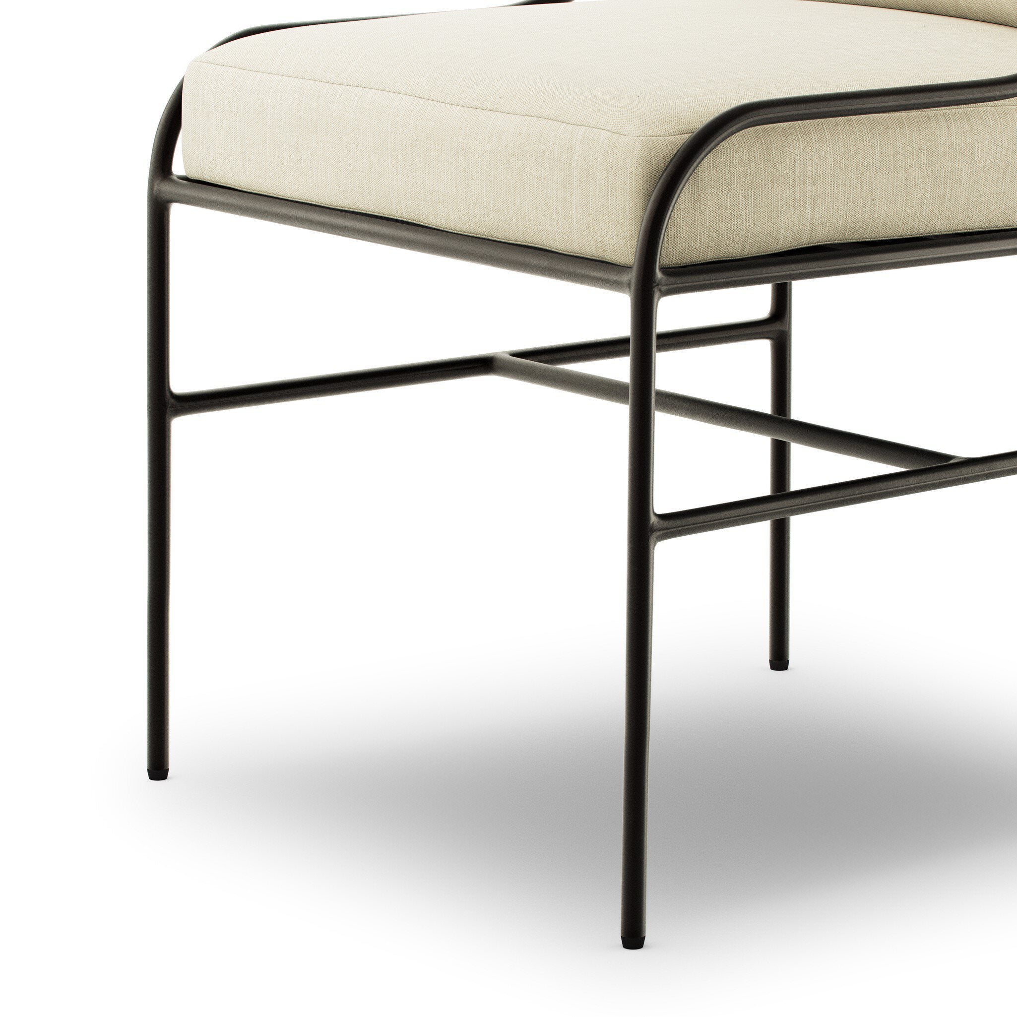 Close up of Four Hands Segovia Outdoor Dining Chair in Vergo Cream on a white background at Addison West