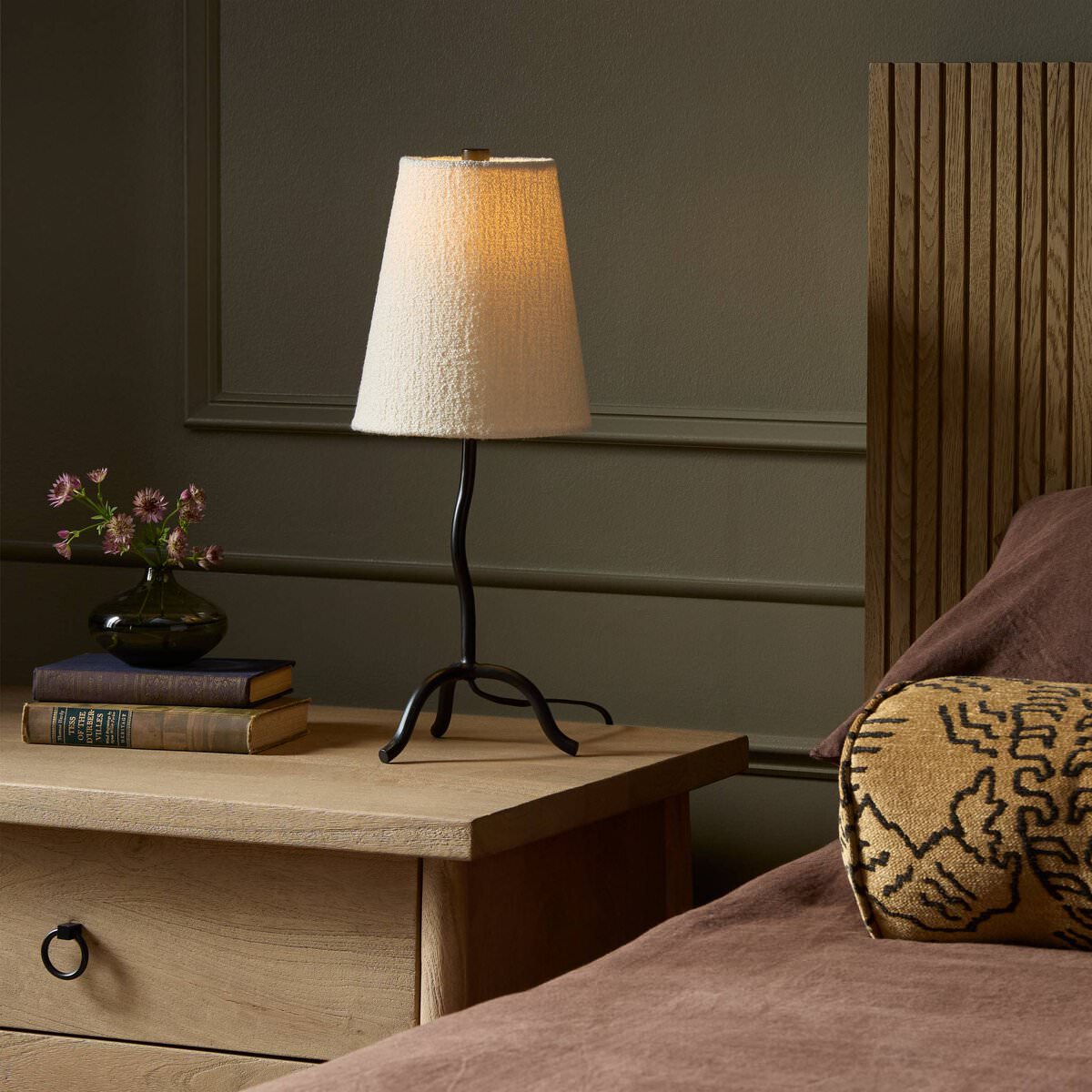 Four Hands Selby Table Lamp in Black Wrought Iron on a bedside table at Addison West