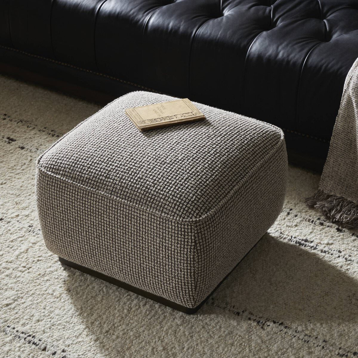 Four Hands Sinclair Square Ottoman 21" in Barrow Taupe in a living room at Addison West