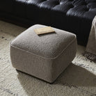 Four Hands Sinclair Square Ottoman 21" in Barrow Taupe in a living room at Addison West