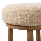 Close up of Four Hands Staria Swivel Counter Stool in Saxon Sand on a white background at Addison West