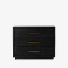 Black Suki nightstand with 3 drawers and brass hardware made by Four Hands Furniture on a white background