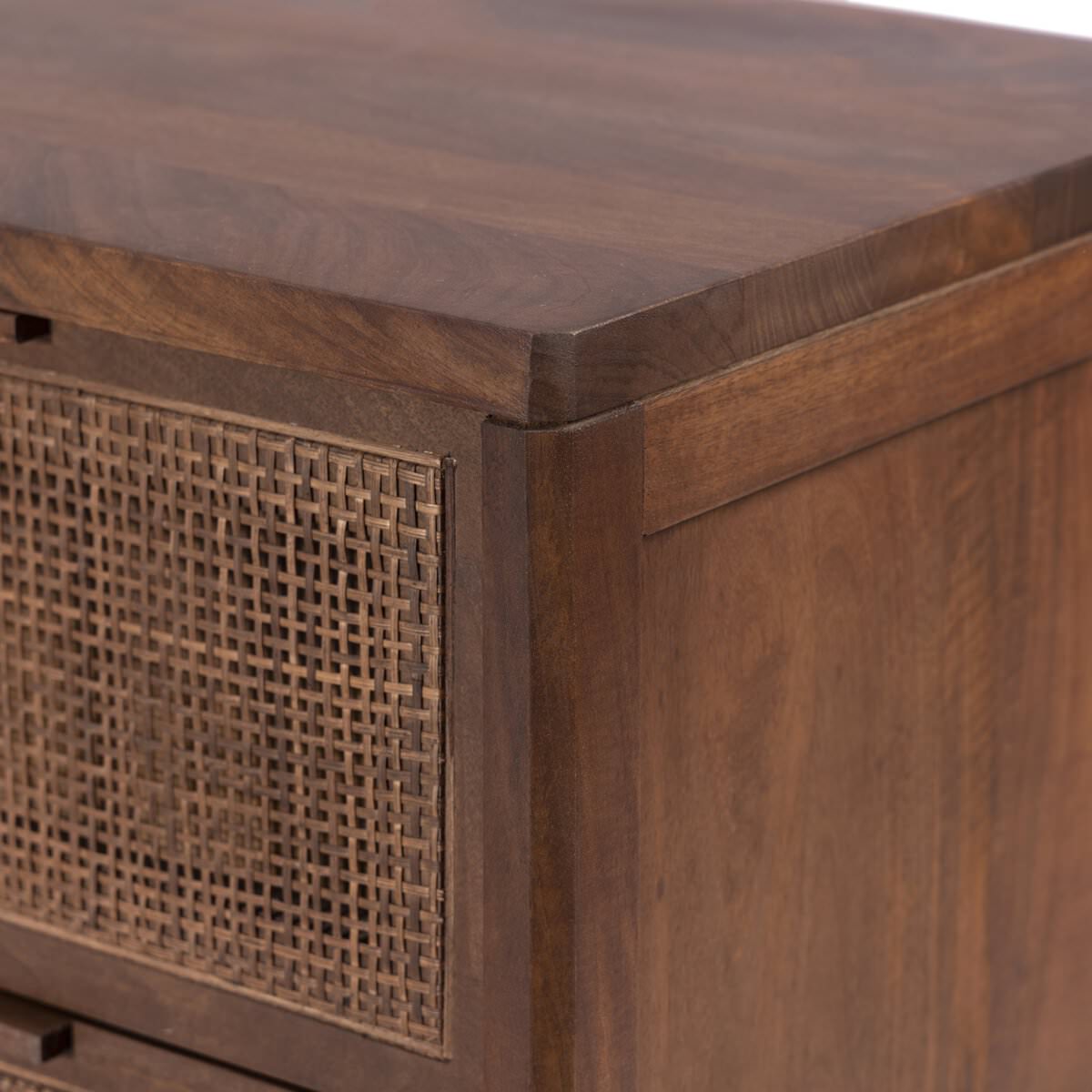 Close up of Four Hands Sydney 9 Drawer Dresser in Brown Cane on a white background