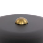 Close up of Four Hands Tennon Table Lamp in Russet Mango on a white background at Addison West