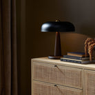 Four Hands Tennon Table Lamp in Russet Mango on a table at Addison West