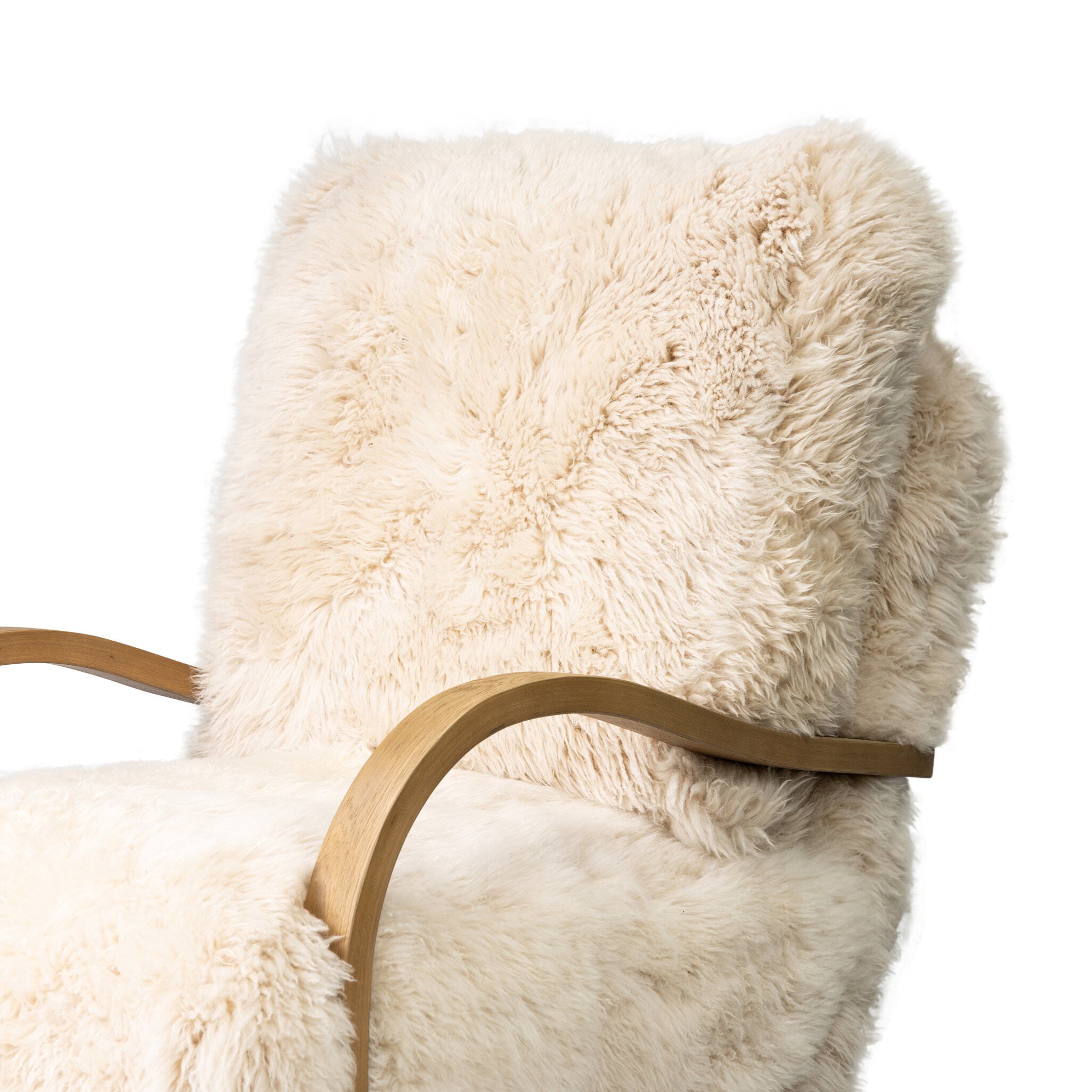 Close up of Four Hands Tobin Chair in Champagne Mongolian Fur on white background at Addison West.