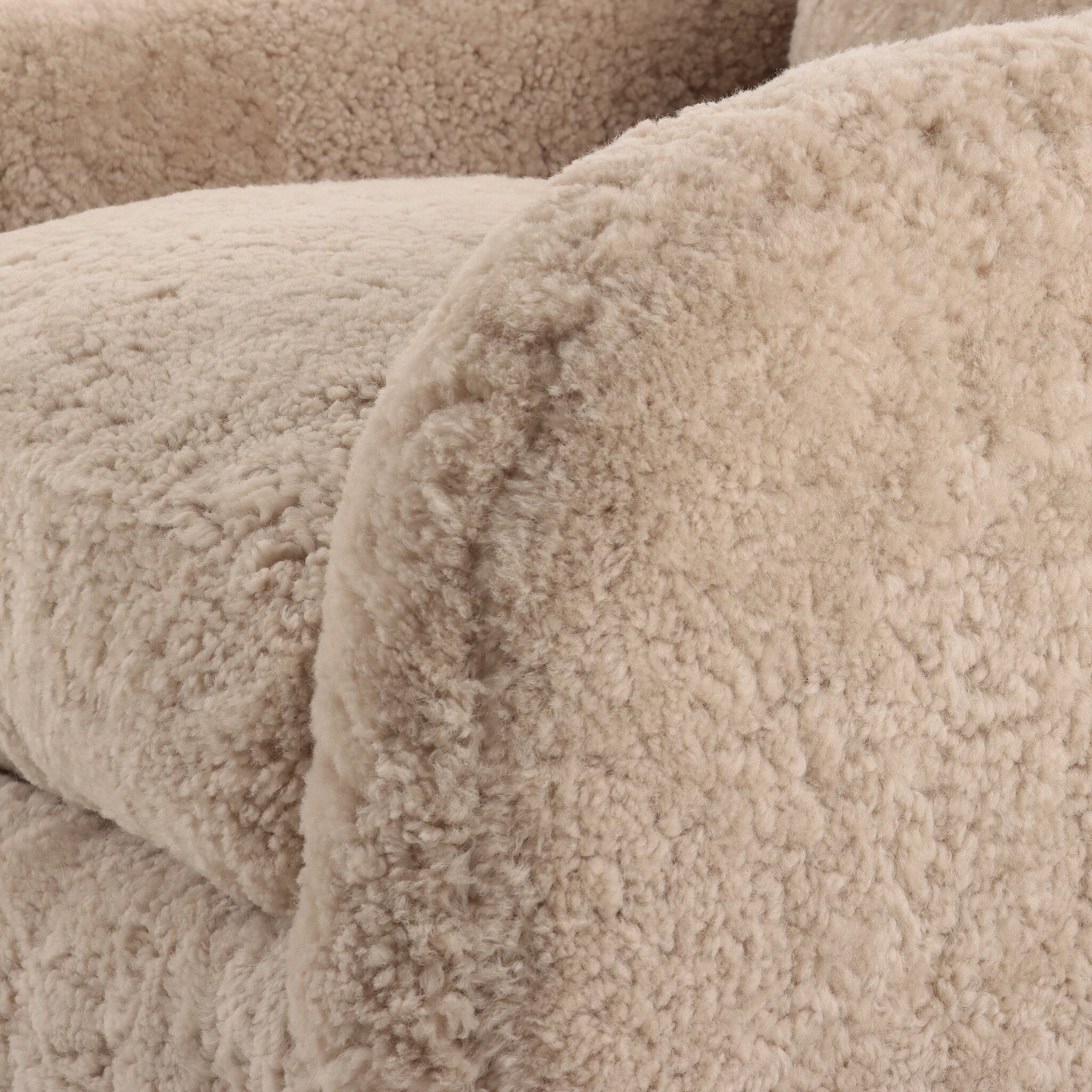 Four Hands Topanga Swivel Chair in Beige Shearling on a white background at Addison West