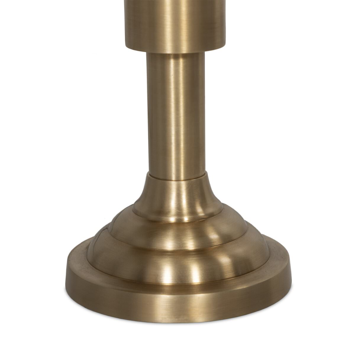 Close up of Four Hands Trieste Table Lamp in Raw Brass on a white background at Addison West