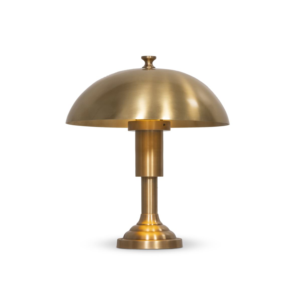 Four Hands Trieste Table Lamp in Raw Brass on a white background at Addison West